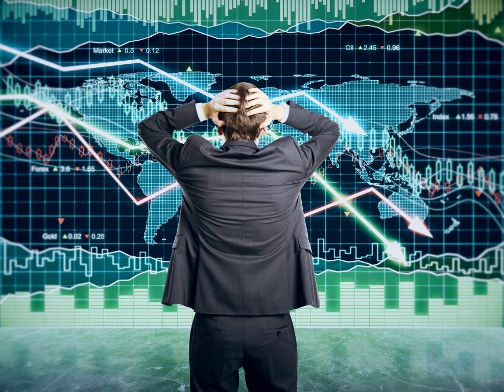 Man looking at stock market chart